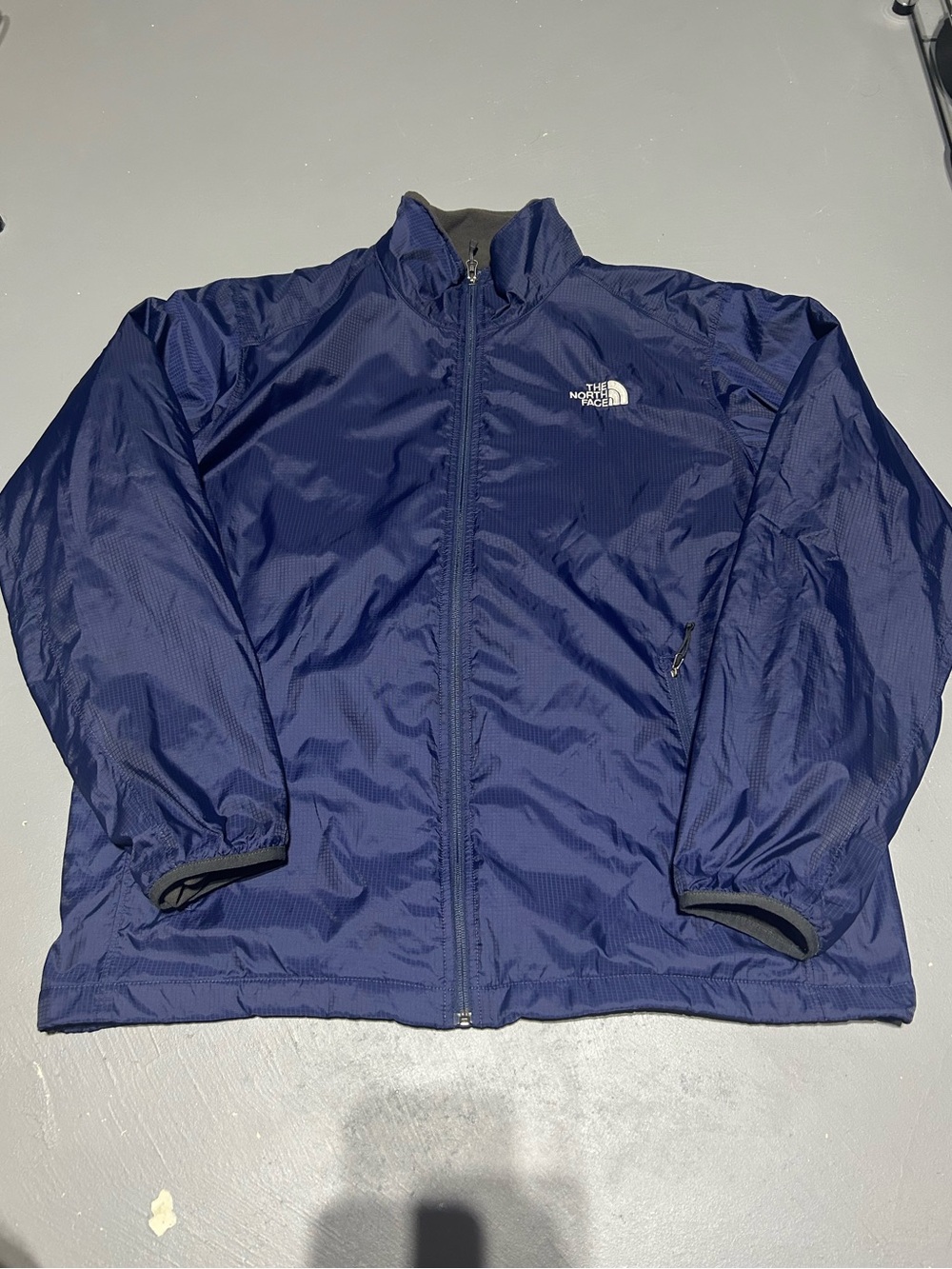 The North Face Blue Fleece-Lined Zip-Up Windbreaker Jacket (Men’s Size XL)